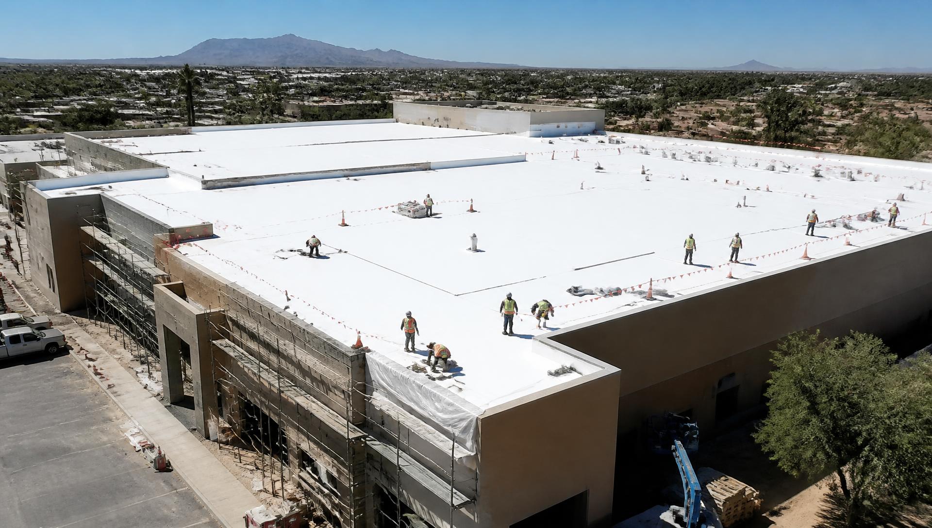 Commercial TPO membrane roof installation on a federal building